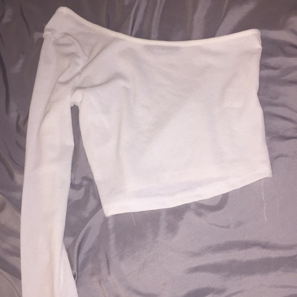 One sleeve white shirt.
